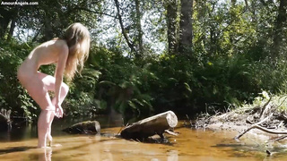 Ultra-Cute, platinum-blonde gal got bare in the nature and began fondling herself in a kinky way