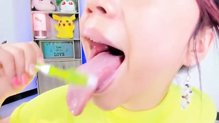 Lila Jordan is brushing her tongue in front of the camera, because it looks beautiful