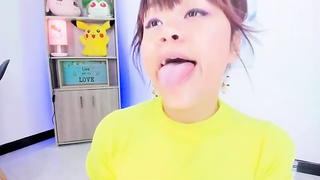 Lila Jordan is brushing her tongue in front of the camera, because it looks beautiful