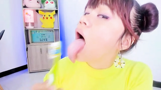 Lila Jordan is brushing her tongue in front of the camera, because it looks beautiful