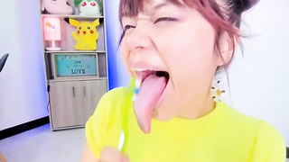 Lila Jordan is brushing her tongue in front of the camera, because it looks beautiful