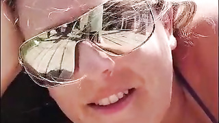 My tramp sunbathing on the beach with duct gauze bathing suit