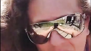 My tramp sunbathing on the beach with duct gauze bathing suit