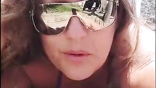 My tramp sunbathing on the beach with duct gauze bathing suit