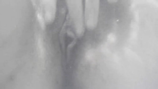 Mischievous, unexperienced honey is fingerblasting her wooly muff in the tub and screaming while jizzing