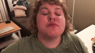 Meaty fuckslut, Alice is licking and demonstrating her large abdomen, in front of the camera