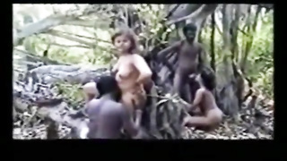 Super-Naughty gal is deepthroating many ebony meatpipes in the woods and stretching up to get banged