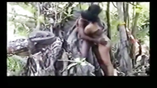 Super-Naughty gal is deepthroating many ebony meatpipes in the woods and stretching up to get banged