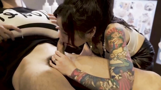 Japanese tat artist, Ai Qiu is about to pulverize one of her customers in her studio.