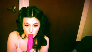Delectable dark haired is fellating a pinkish fuck-fest fucktoy to flash us how she enjoys to satiate dudes