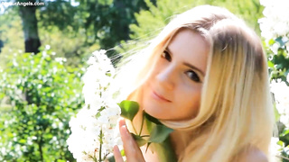 Petite boobed, ash-blonde honey is posing braless on webcam and even flashing her purrfectly hairless honeypot