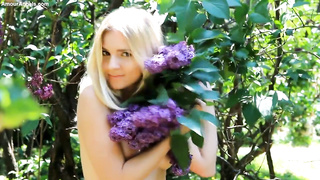 Petite boobed, ash-blonde honey is posing braless on webcam and even flashing her purrfectly hairless honeypot