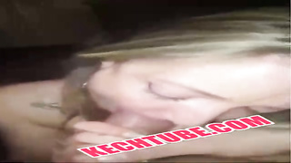 Sultry ash-blonde damsel with crimson lips is deepthroating a stranger's shaft, not even knowing his name