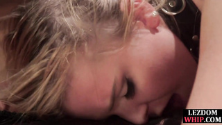 Lesdom mistress sits on face strapon with sub