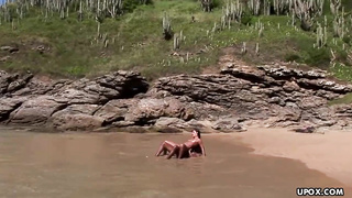 Suntanned brown-haired is downright nude, on the beach and in the mood for a casual pulverize