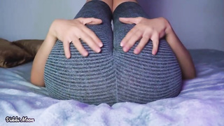 Stunner in yoga trousers is about to showcase her twat and knead it a bit
