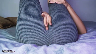 Stunner in yoga trousers is about to showcase her twat and knead it a bit