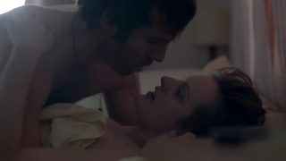 Elisabeth Moss is making out with her paramour, in the woods, before having fuck-fest with him