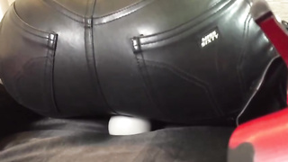 Uber-Sexy platinum-blonde dame in ebony, leather trousers and high high-heeled shoes is taunting on web cam, just for joy