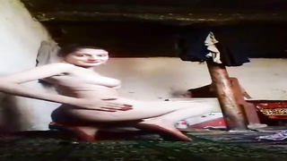 Unexperienced cougar with yam-sized funbags is posing in front of the camera with no clothes on