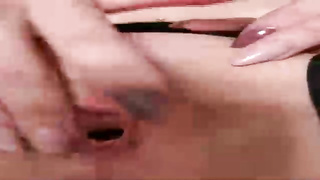 Jiggly stunner is delicately groping her moist cootchie and making a jaws- watering close- up of it