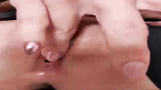 Jiggly stunner is delicately groping her moist cootchie and making a jaws- watering close- up of it