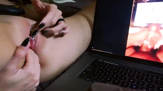 Kinky stunner is using a glass fake penis while jerking on webcam, in the middle of the night