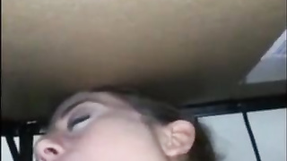 Inexperienced doll is deep-throating her roomy's weenie like a real professional, from under the table