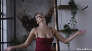 Fantastic dark-haired, StellaQ is posing in the late afternoon and leisurely taking off her clothes