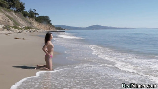 Asian beach babe fingering her tight pussy