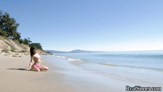 Asian beach babe fingering her tight pussy