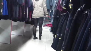 Hidden Cam in public places looks under the skirts of damsels with appetizing backsides.