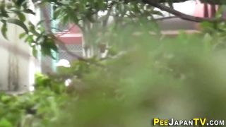 Observed Japanese stunner pees outdoors