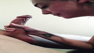 Lusty dark-haired has dark-hued belt in fellatios, because she is doing it all the time