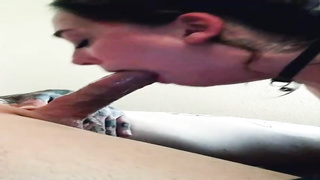 Lusty dark-haired has dark-hued belt in fellatios, because she is doing it all the time