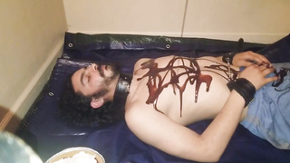 Domme is prepared to have joy with her victim, right after she frosts him with chocolate