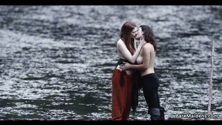Raven and Bree Daniels are tonguing each other up next to the lake and lovin’ it