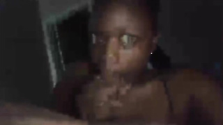 Ebony stunner is deep-throating man rod in the middle of the night, in front of the camera