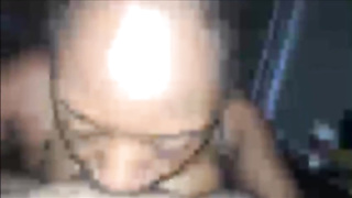 Ebony stunner is deep-throating man rod in the middle of the night, in front of the camera