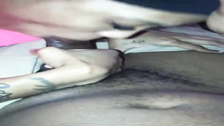 Whorish, Ebony woman is impatiently blowing a rock rock hard meatpipe, in the middle of the night