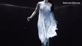 Nude stunner, Alla Birtakik is performing under water and oftentimes opening up up to showcase her snatch