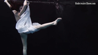Nude stunner, Alla Birtakik is performing under water and oftentimes opening up up to showcase her snatch