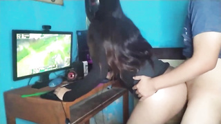 Dark-Haired with long hair is getting banged from the back while toying her dearest game