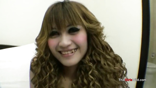 Thai stunner with curly hair is eagelry deepthroating a rock rigid man rod, free-for-all of any charge