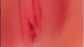 Crazy dark-haired is showcasing her brilliantly clean-shaven gash on webcam and then pissing a bit