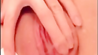 Crazy dark-haired is showcasing her brilliantly clean-shaven gash on webcam and then pissing a bit