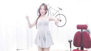 Enrapturing dark haired in a supah brief sundress is dancing in front of the web camera