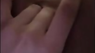 First-Timer honey is massaging her cunt in front of the camera and bellowing while jizzing