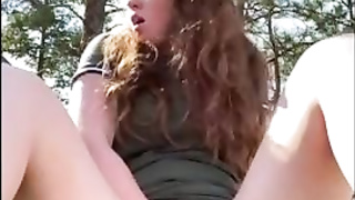 Crimson haired stunner is draining during a hiking excursion and shrieking from sensation during an ejaculation