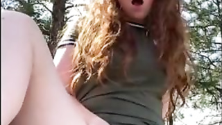 Crimson haired stunner is draining during a hiking excursion and shrieking from sensation during an ejaculation